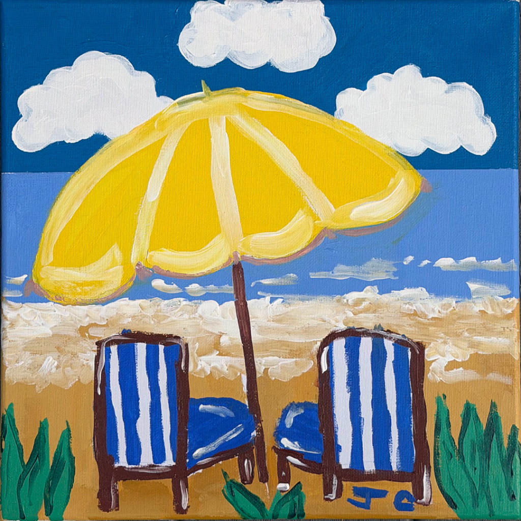 Beach scen with two blue striped chairs and a yellow umbrella