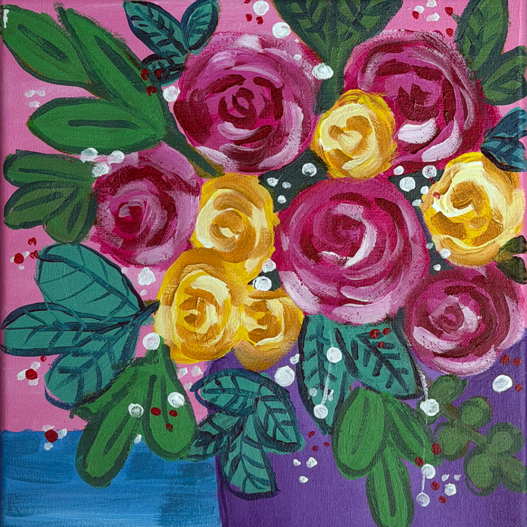 Multicolored flowers in purple vase